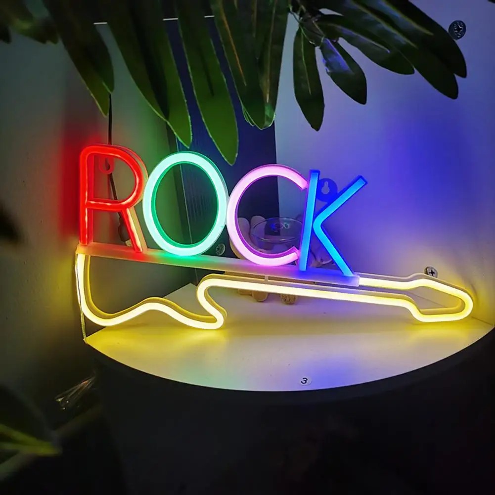 led neonski napis na steni - rock kitara